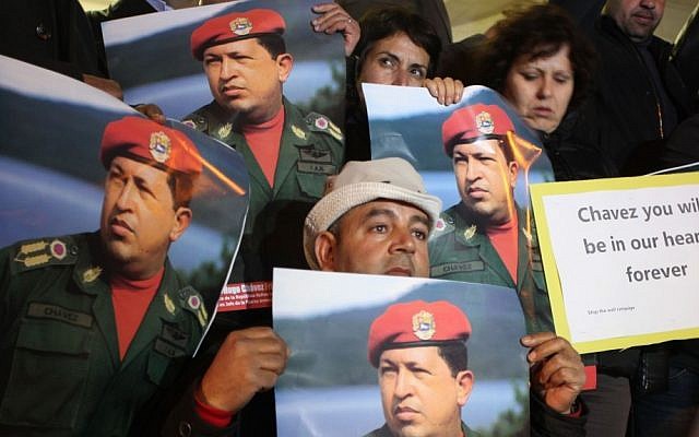 Palestinians hold portraits of late Venezuelan president Hugo Chavez during a rally in front of Venezuelan Embassy, in the West Bank city of Ramallah on March 6, 2013 (photo credit: Issam Rimawi/Flash90) Palestinians hold portraits of late Venezuelan president Hugo Chavez during a rally in front of Venezuelan Embassy, in the West Bank city of Ramallah on March 6, 2013 (photo credit: Issam Rimawi/Flash90)