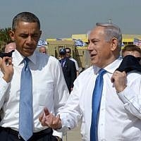 US President Barack Obama and Prime Minister Benjamin Netanyahu go informal at Ben Gurion Airport, March 22, 2013 (photo credit: Avi Ohayon/GPO/Flash90)