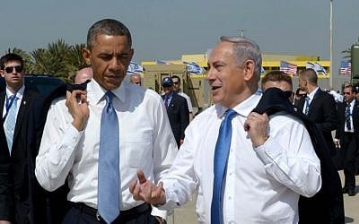 US President Barack Obama and Prime Minister Benjamin Netanyahu go informal at Ben Gurion Airport, March 22, 2013 (photo credit: Avi Ohayon/GPO/Flash90)