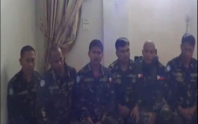 Kidnapped UN peacekeepers in Syria seen in a video released last Thursday. (photo credit: YouTube screenshot) Kidnapped UN peacekeepers in Syria seen in a video released last Thursday. (photo credit: YouTube screenshot)