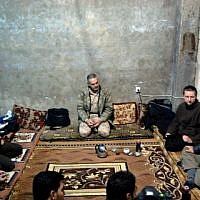 FSA commander, Jameel Radoon, (center) in the town of Qalaat al-Madik with fellow opposition fighters and Eliyahu Kamisher (right) (photo: Hector Sharp)