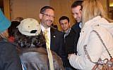 Yesh Atid MK Dov Lipman meets with members of the audience after being publicly interviewed at the Jerusalem Great Synagogue on March 9 at an event marking The Times of Israel's first anniversary (photo credit: Sharon Marks Altshul / the Real Jerusalem Streets)