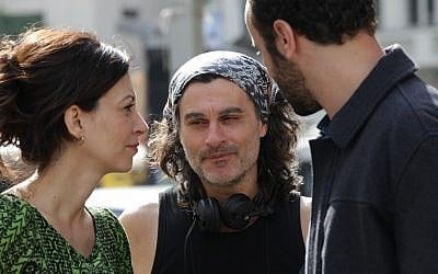 Ziad Doueiri (center) with actors Ali Suliman (right) and Reymond Amsalem (left), on the set of 'The Attack' (courtesy/Ziad Doueiri)