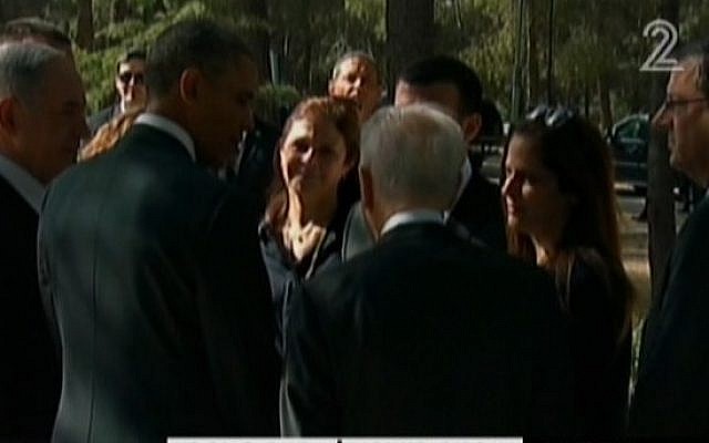 President Obama meets with members of the family of assassinated prime minister Yitzhak Rabin, as Prime Minister Netanyahu and President Peres look on, at Rabin’s grave on Friday, March 22 (photo credit: Channel 2 screenshot) President Obama meets with members of the family of assassinated prime minister Yitzhak Rabin, as Prime Minister Netanyahu and President Peres look on, at Rabin’s grave on Friday, March 22 (photo credit: Channel 2 screenshot)