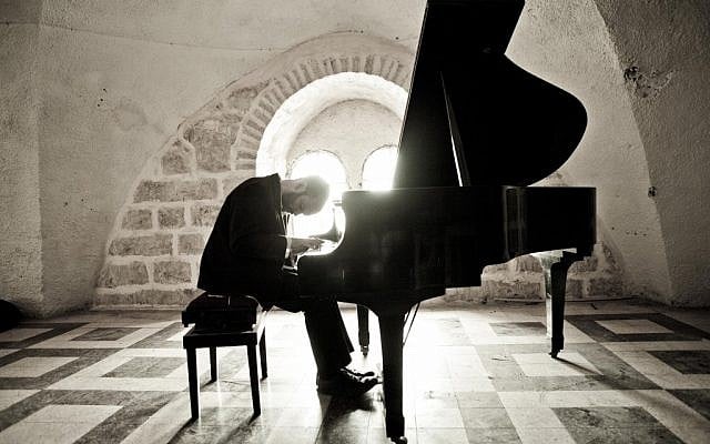 Yonatan Razel at the piano, his instrument of choice (Ohad Romano)