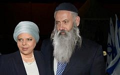 Sara and Benjamin Netanyahu portrayed as ultra-Orthodox photo credit: Rosy Afriat/Facebook)
