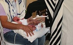 A circumcision performed at home. (photo credit: courtesy)