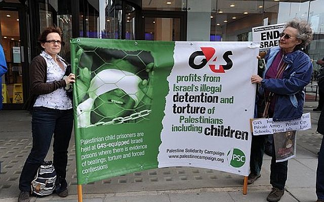 Palestine Solidarity Campaign protesters demonstrating against G4S in front of their offices in England. (photo credit: CC BY Stephen Sizer/Palestine Solidarity Campaign, Flickr) Palestine Solidarity Campaign protesters demonstrating against G4S in front of their offices in England. (photo credit: CC BY Stephen Sizer/Palestine Solidarity Campaign, Flickr)