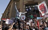 Egyptian protesters chant slogans against Islamist President Mohammed Morsi, during a protest in front of the prosecutor general's office in Cairo, Egypt, Friday, March 29, 2013. (photo credit: AP/Amr Nabil)