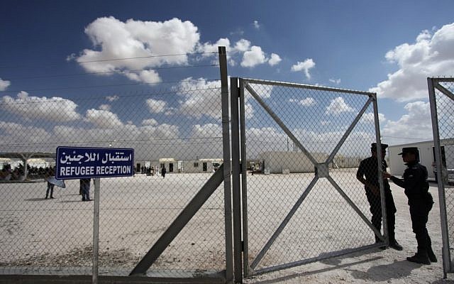 Illustrative photo of guards at the entrance to the Mrajeeb al-Fhood refugee camp in Zarqa, Jordan, April 10, 2013. (AP/Mohammad Hannon) Illustrative photo of guards at the entrance to the Mrajeeb al-Fhood refugee camp in Zarqa, Jordan, April 10, 2013. (AP/Mohammad Hannon)