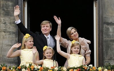 Dutch King Willem-Alexander and Queen Maxima appear on the balcony of the Royal Palace with their children, from left: Catharina-Amalia, Ariane, and Alexia in Amsterdam, The Netherlands, on Tuesday April 30, 2013. (photo credit: AP Photo/Daniel Ochoa de Olza)