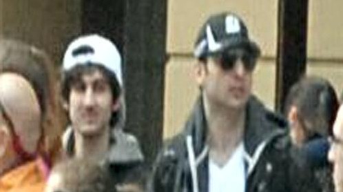 This photo released by the FBI early Friday April 19, 2013, shows the Tsarnaev brothers, with Tamerlan on the right, walking through the crowd in Boston on Monday, April 15, before the explosions at the Boston Marathon. (photo credit: AP/FBI) This photo released by the FBI early Friday April 19, 2013, shows the Tsarnaev brothers, with Tamerlan on the right, walking through the crowd in Boston on Monday, April 15, before the explosions at the Boston Marathon. (photo credit: AP/FBI)