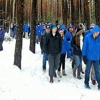 March of the Living participants in the Lupachowo Forest, site of a mass execution of Jews from the town of Tykocin, in 2013 (Courtesy) March of the Living participants in the Lupachowo Forest, site of a mass execution of Jews from the town of Tykocin, in 2013 (Courtesy)