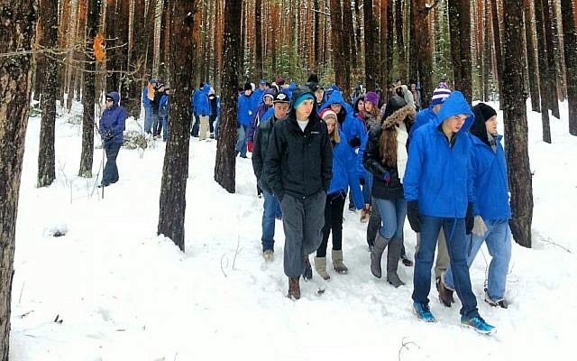 March of the Living participants in the Lupachowo Forest, site of a mass execution of Jews from the town of Tykocin, in 2013 (Courtesy) March of the Living participants in the Lupachowo Forest, site of a mass execution of Jews from the town of Tykocin, in 2013 (Courtesy)