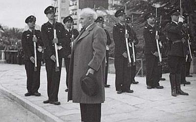 Israel's first prime minister David Ben-Gurion stands at attention as the national anthem, Hatikva, is played at the Knesset opening ceremony in 1949. (GPO/Hugo Mendelson)