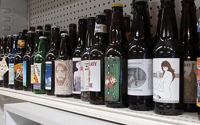 A display of home-brewed beers. Thinking of the bonfires of Lag b'Omer, a Jewish home brewer suggests a smoked porter. (photo credit: Edmon J. Rodman/JTA)