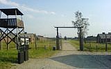 A guard tower at the Auschwitz-Birkenau concentration camp in Poland (photo credit: CC BY Fish and karate, Wikimedia Commons)