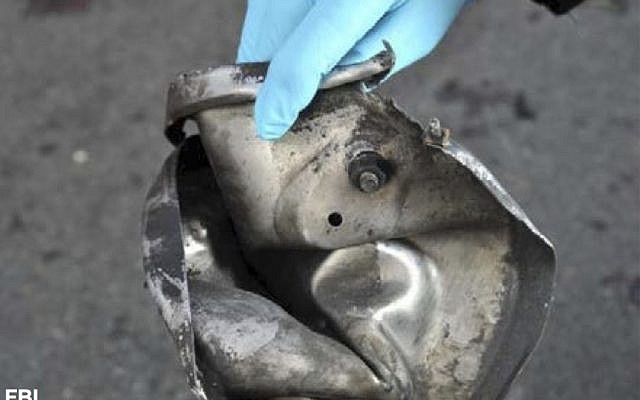 This image from an FBI and Department of Homeland Security joint bulletin issued to law enforcement and obtained by The Associated Press, shows the remains of a pressure cooker that the FBI says was part of one of the bombs that exploded during the Boston Marathon (photo credit: AP/FBI) This image from an FBI and Department of Homeland Security joint bulletin issued to law enforcement and obtained by The Associated Press, shows the remains of a pressure cooker that the FBI says was part of one of the bombs that exploded during the Boston Marathon (photo credit: AP/FBI)