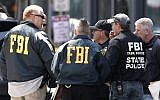Illustrative image of FBI agents (AP/Winslow Townson)