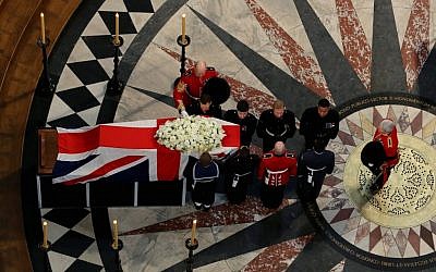 The coffin containing the body of former British prime minister Margaret Thatcher leaves the ceremonial funeral at St Paul's Cathedral in London, Wednesday April 17 (photo credit: AP Photo/Gareth Fuller, Pool)
