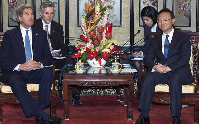 US Secretary of State John Kerry, left, meets with Chinese State Councilor Yang Jiechi in the Diaoyutai State Guesthouse Saturday, April 13, 2013 in Beijing (photo credit: AP/Paul J. Richards) US Secretary of State John Kerry, left, meets with Chinese State Councilor Yang Jiechi in the Diaoyutai State Guesthouse Saturday, April 13, 2013 in Beijing (photo credit: AP/Paul J. Richards)