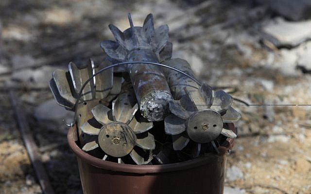 A bucket of mortar shell pieces from bombs fired by Palestinians in the Gaza Strip into Israel, March 19, 2011. (Tsafrir Abayov/Flash90) A bucket of mortar shell pieces from bombs fired by Palestinians in the Gaza Strip into Israel, March 19, 2011. (Tsafrir Abayov/Flash90)