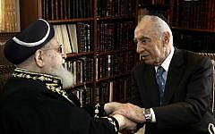 President Shimon Peres shakes hands with Shas spiritual leader Rabbi Ovadia Yosef in Jerusalem last year (photo credit: Kobi Gideon/Flash90)
