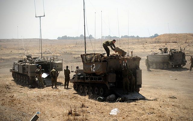 Soldiers during a surprise drill in the Golan Heights in September 2012. (photo credit: Shay Wagner/IDF/Flash90) Soldiers during a surprise drill in the Golan Heights in September 2012. (photo credit: Shay Wagner/IDF/Flash90)