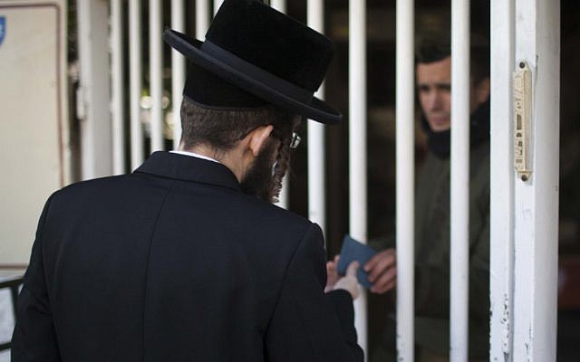 An ultra-Orthodox man enters the army recruiting office in Jerusalem (photo credit: Yonatan Sindel/Flash90) An ultra-Orthodox man enters the army recruiting office in Jerusalem (photo credit: Yonatan Sindel/Flash90)