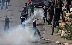 Palestinians clashing with troops near the Ofer military prison  in April. (photo credit: issam Rimawi/Flash90)