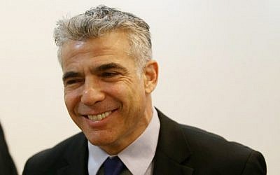 Finance minister Yair Lapid. (photo credit: Alex Kolomoisky/Flash90)