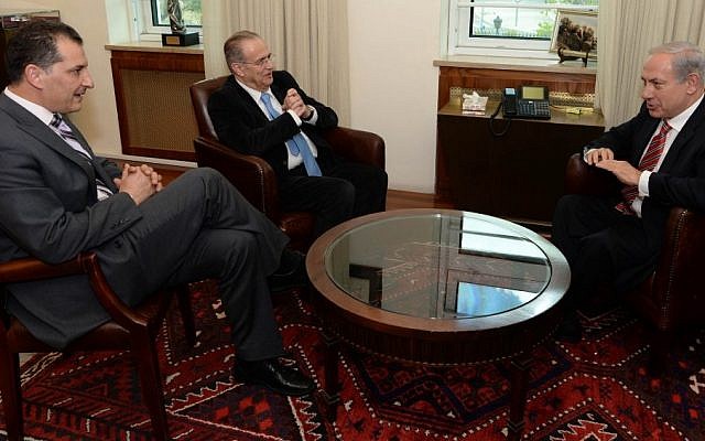 Benjamin Netanyahu with Cypriot Foreign Minister Ioannis Kasoulides (C) and Energy and Commerce Minister Yiorgos Lakkotrypis, April 09, 2013. (photo credit: Kobi Gideon/GPO/Flash90) PM Netanyahu with Cypriot Foreign Minister Ioannis Kasoulides (C) and Energy and Commerce Minister Yiorgos Lakkotrypis, April 09, 2013. (photo credit: Kobi Gideon/GPO/Flash90)