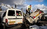 Rescue personnel at the site of a mass car crash that left 6 dead on a major Haifa road, Wednesday, April 10, 2013 (photo credit: Avishag Shaar Yashuv/Flash90)