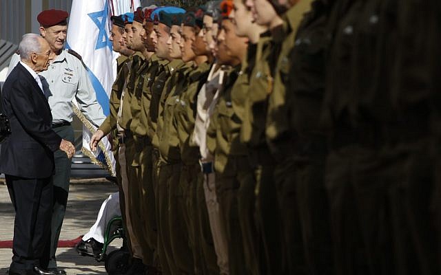 Shimon Peres and Benny Gantz inspecting top-performing soldiers at the President's Residence Tuesday. (photo credit: Miriam Alster/Flash90) Shimon Peres and Benny Gantz inspecting top-performing soldiers at the President's Residence Tuesday. (photo credit: Miriam Alster/Flash90)