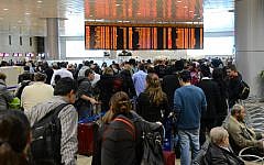 Illustrative: Travelers standing in line at the departure hall at Terminal 1 of Ben Gurion International Airport (Yossi Zeliger/Flash90)