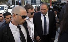 Former Foreign Minister Avigdor Liberman makes his way to Jerusalem Magistrate's Court on April 25 (photo credit: Yonatan Sindel/Flash90)