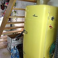 The yellow refrigerator in its staircase niche (photo credit: Jessica Steinberg/Times of Israel) The yellow refrigerator in its staircase niche (photo credit: Jessica Steinberg/Times of Israel)