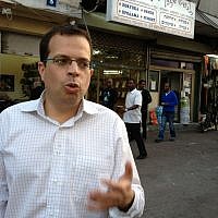 Liad Shoham delved into the invisibility of Tel Aviv's African refugee population in his latest book (photo credit: Jessica Steinberg/Times of Israel)