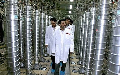 Then-Iranian President Mahmoud Ahmadinejad visits the Natanz Uranium Enrichment Facility some 200 miles (322 kilometers) south of the capital Tehran, Iran in 2008. (AP/Iranian President's Office) Then-Iranian President Mahmoud Ahmadinejad visits the Natanz Uranium Enrichment Facility some 200 miles (322 kilometers) south of the capital Tehran, Iran in 2008. (AP/Iranian President's Office)