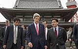 US Secretary of State John Kerry, center, tours the Zojoji Buddhist temple in Tokyo Sunday, April 14, 2013. (photo credit: AP/Paul J. Richards)