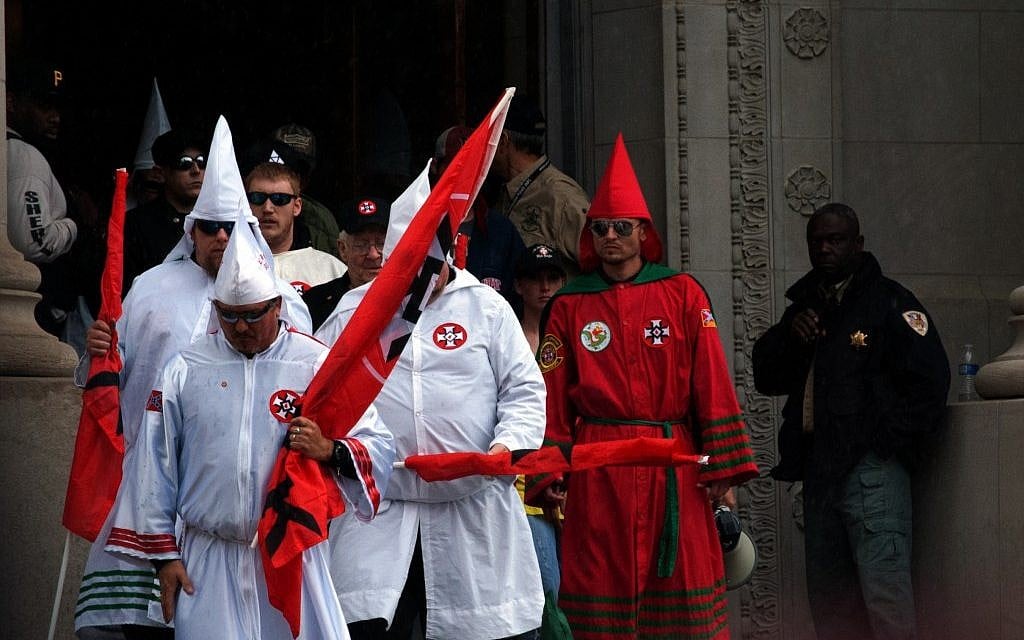 Klansmen exiting the Shelby County Courthouse in Memphis, Tennessee, moments before their rally, March 30, 2013. (photo credit: JTA/Blake Billings) Klansmen exiting the Shelby County Courthouse in Memphis, Tennessee, moments before their rally, March 30, 2013. (photo credit: JTA/Blake Billings)