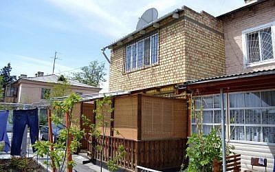 A house where Tsarnaev brothers, Dzhokhar and Tamerlan suspects in the Boston Marathon bombings, were lived in before leaving for Dagestan, in a small Kyrgyz city Tokmok east of the country's capital of Bishkek, on Friday, April 20, 2013. (photo credit: AP/Abylay Saralayev)