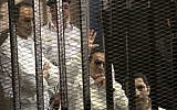 Former Egyptian president Hosni Mubarak waves to his supporters, Saturday, April 13, 2013 (photo credit: AP/ Tarek el Gabbas)
