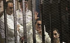 Former Egyptian president Hosni Mubarak waves to his supporters, Saturday, April 13, 2013 (photo credit: AP/ Tarek el Gabbas)