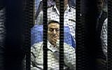 Egypt's deposed president Hosni Mubarak attends a hearing session in his retrial on appeal in Cairo, Egypt, Monday, April 15, 2013 (photo credit: AP/Ahmed Gomaa)