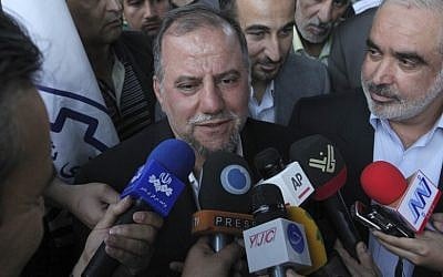Iranian scientist Mojtaba Atarodi speaks to journalists, upon his arrival at the Imam Khomeini airport outside Tehran, Iran, Saturday, April 27 (photo credit: AP/Vahid Salemi)