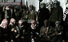 This undated image posted on a militant website purports to show militants in the al-Jazeera region on the Iraqi side of the Syria-Iraq border (photo credit: AP)