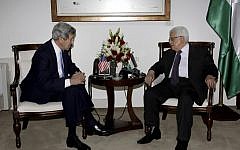 Palestinian President Mahmoud Abbas, right, meets with US Secretary of State John Kerry in Ramallah on Sunday, April 7, 2013. (photo credit:AP/Mohamed Torokman)