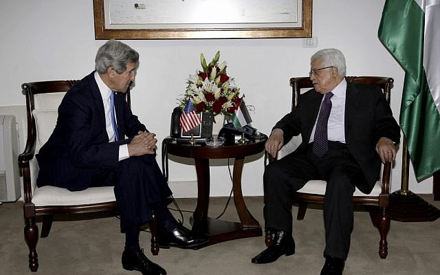Palestinian President Mahmoud Abbas, right, meets with US Secretary of State John Kerry in Ramallah on Sunday, April 7, 2013. (photo credit:AP/Mohamed Torokman)