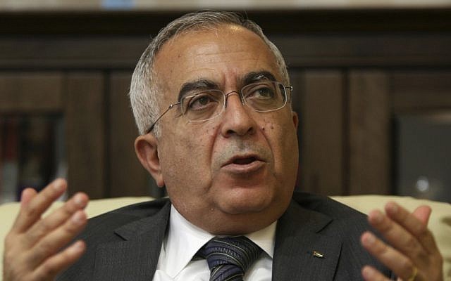 Palestinian Authority Prime Minister Salaam Fayyad speaks during an interview with The Associated Press in the West Bank city of Ramallah, 2011 (photo credit: AP/Majdi Mohammed, File) Palestinian Authority Prime Minister Salaam Fayyad speaks during an interview with The Associated Press in the West Bank city of Ramallah, 2011 (photo credit: AP/Majdi Mohammed, File)